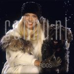 Linda de Mol (Date Unknown) at studio in Amsterdam.

[keywords]Posed, Half Length, Eyecontact, Smiling, Snow, Dog[/keywords]